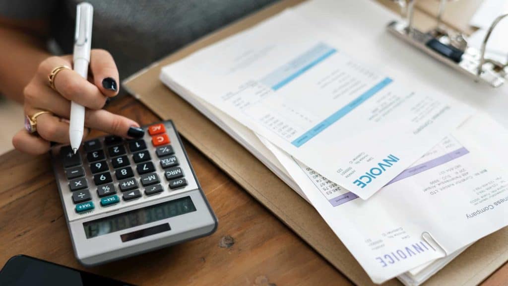 accountant calculator invoice