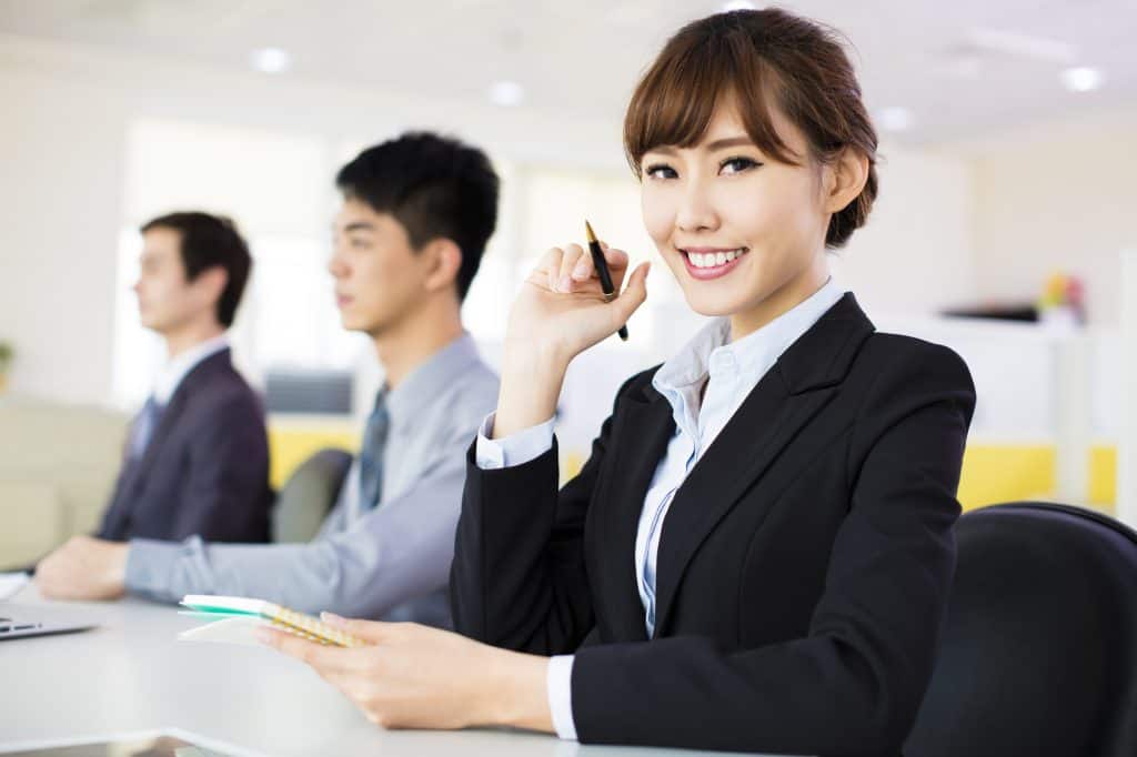 business woman with her staff in conference room