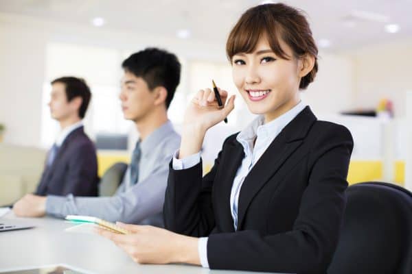 business woman with her staff in conference room