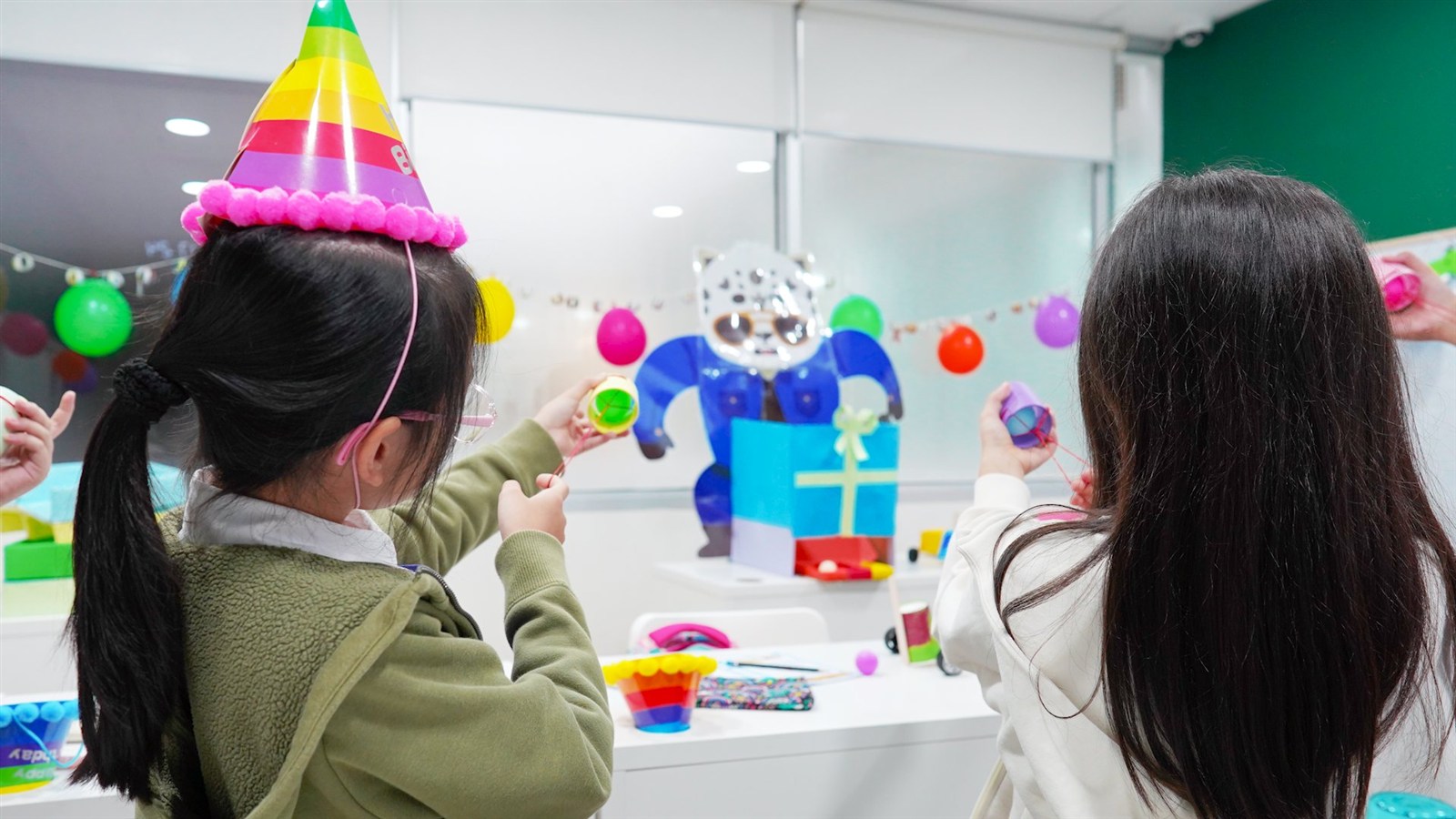 Children taking part in a STEM and Robotics programme at The Pique Lab